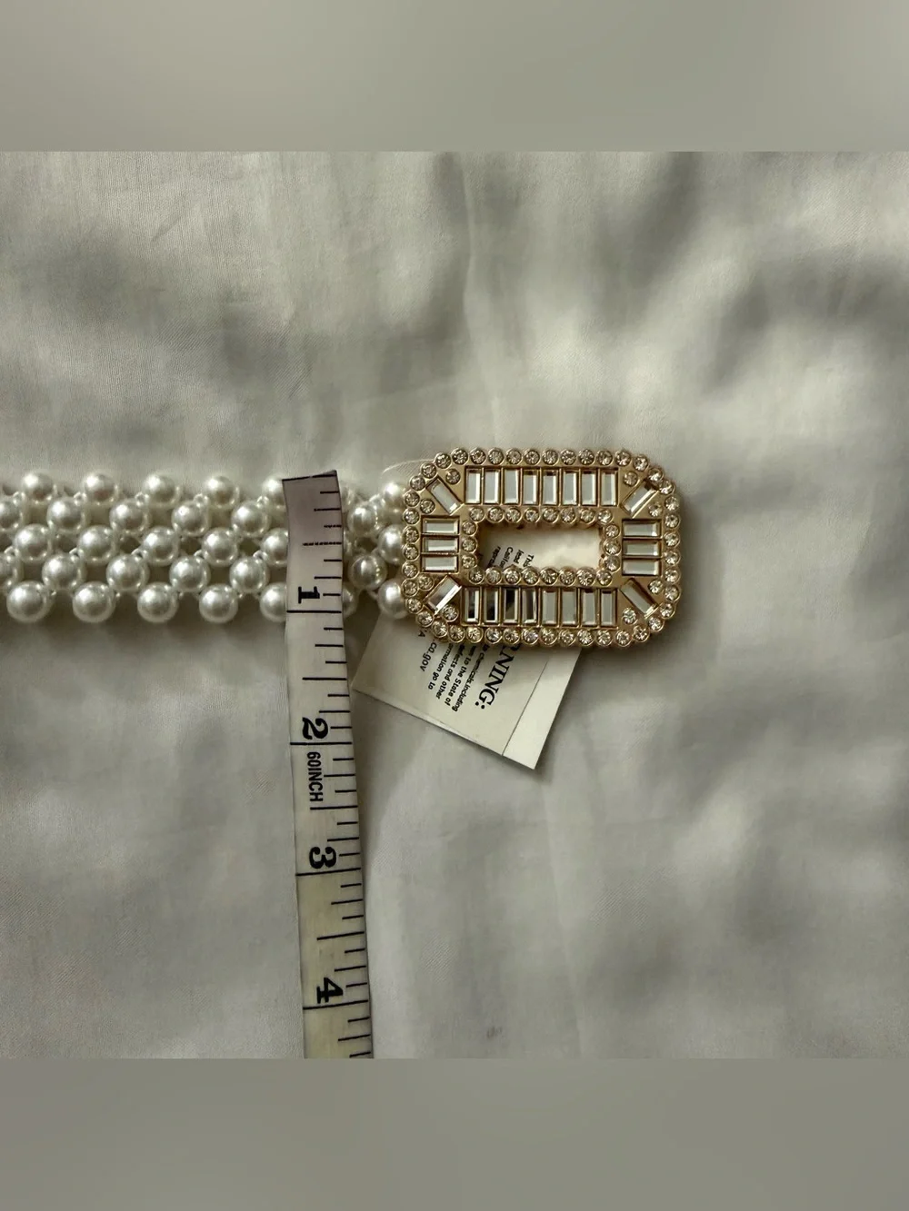 Faux pearls elasticized waistband skinny belt with gold tone rectangle buckle